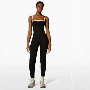 437 Black & Crème Onesie